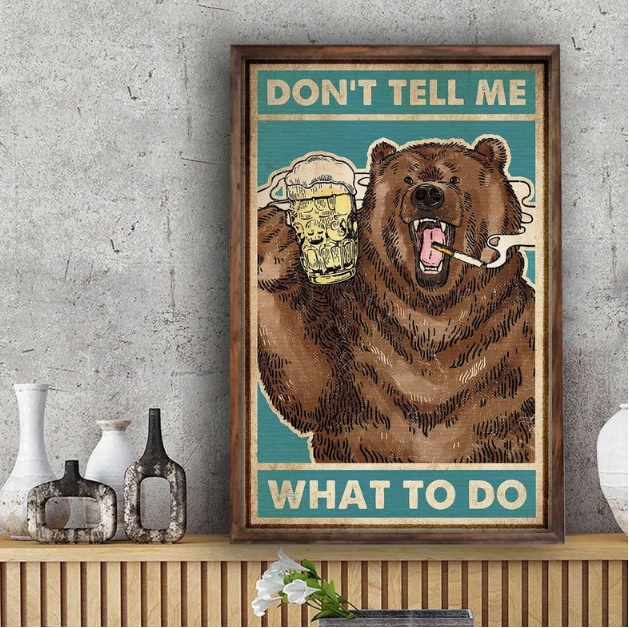 Quadro de urso tomando cerveja